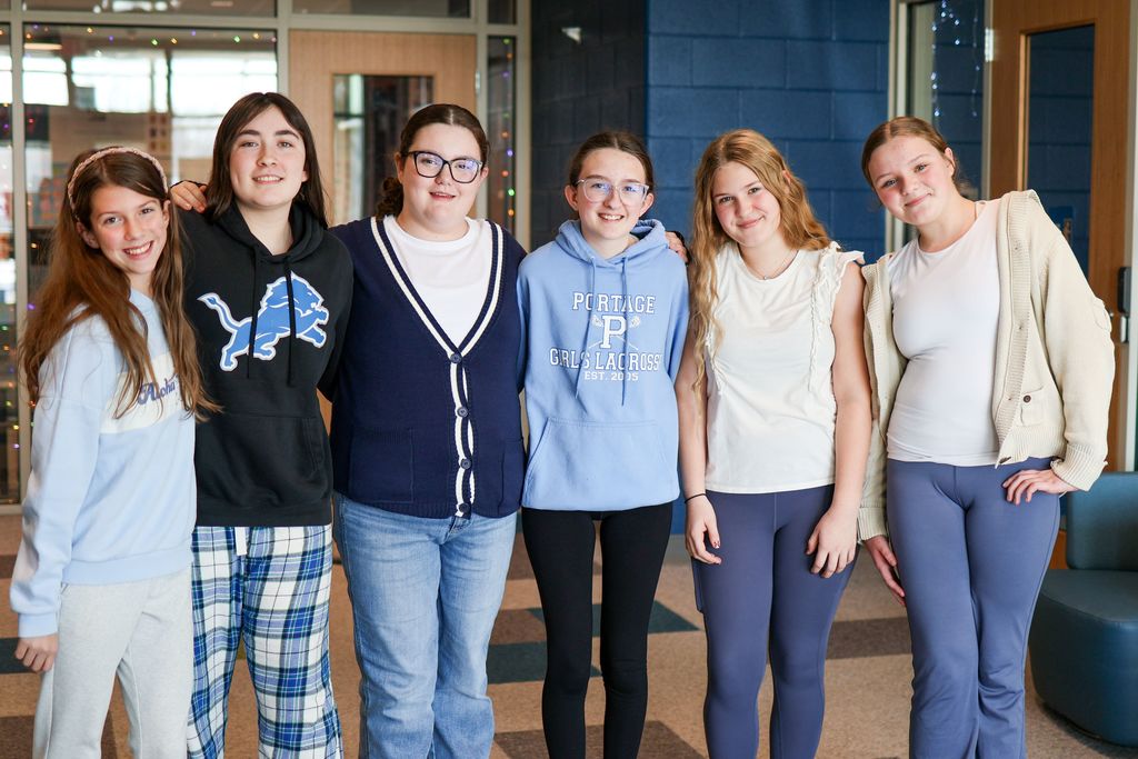 a group of students pose for a photo