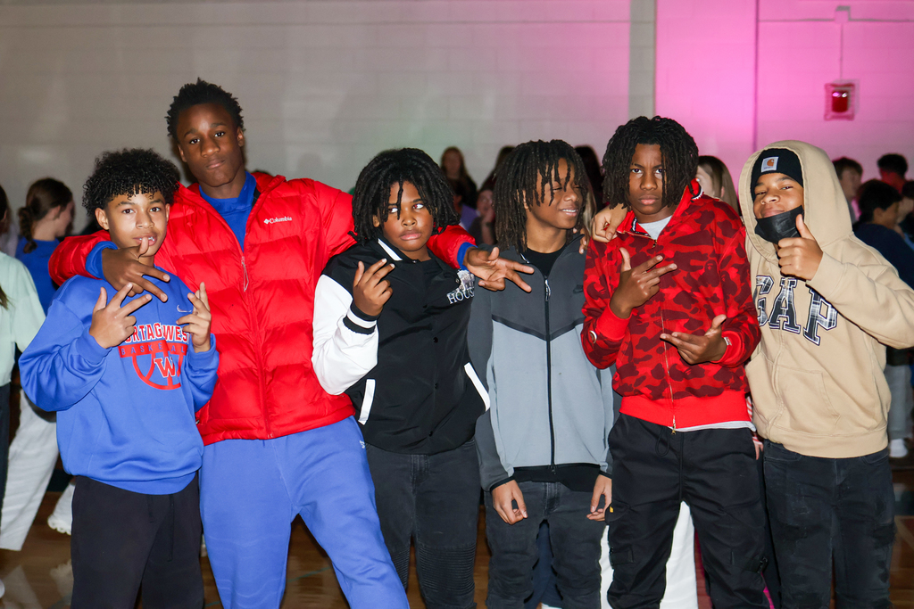 a group of boys posing for a photo