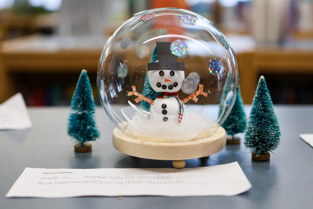 a snow globe with a snowman inside