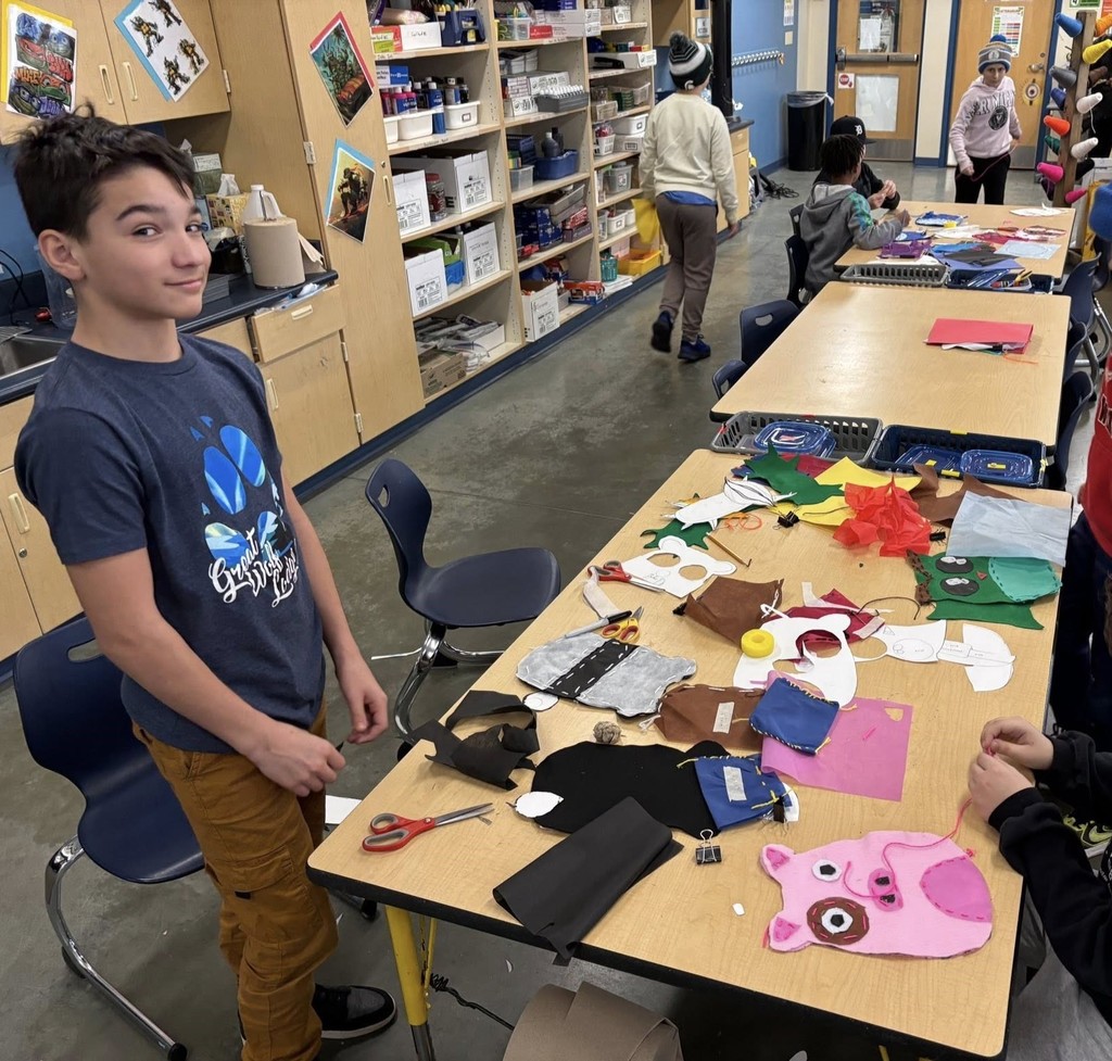 students sewing their own stuffed animals 