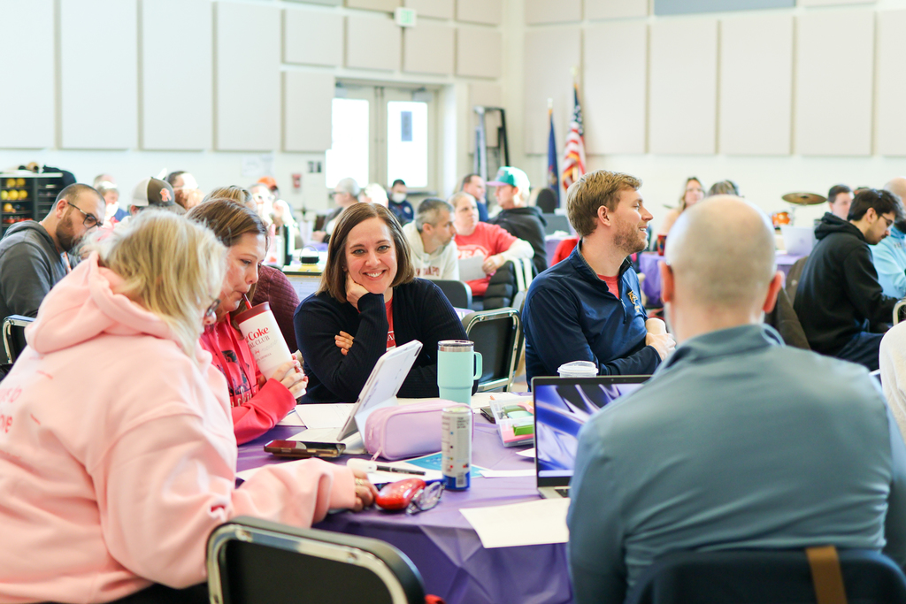 people sitting around a table together