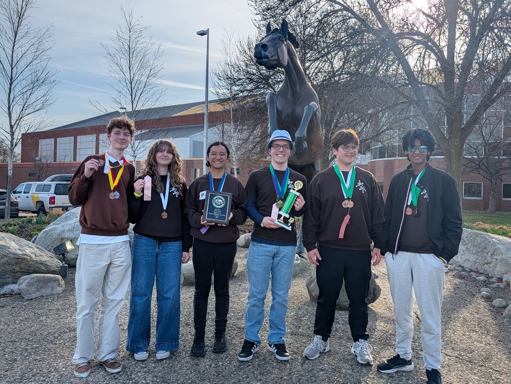 students at wmu with medals from science olympiad