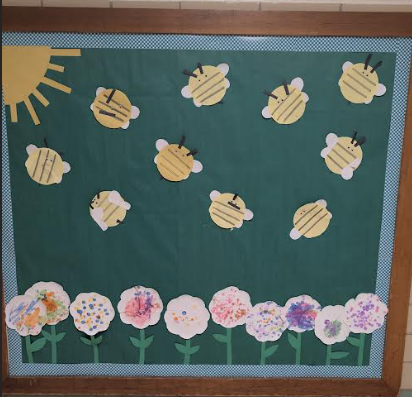 Artwork with bumble bees on the wall.