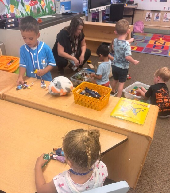 Students learning in a classroom together.