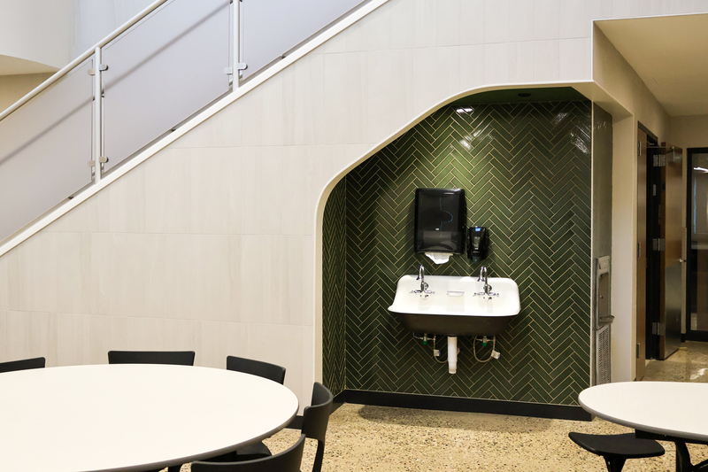 a water fountain sink area in a cafeteria