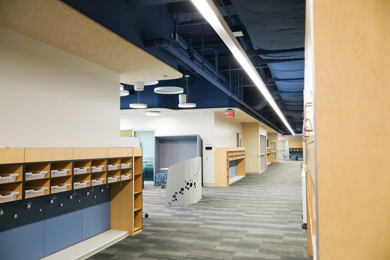 a hallway with cubbies