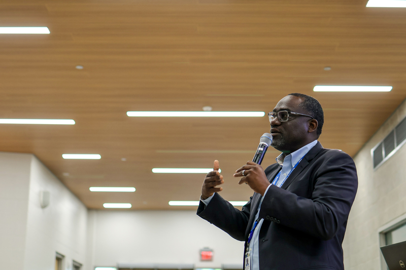 a man speaks into a microphone