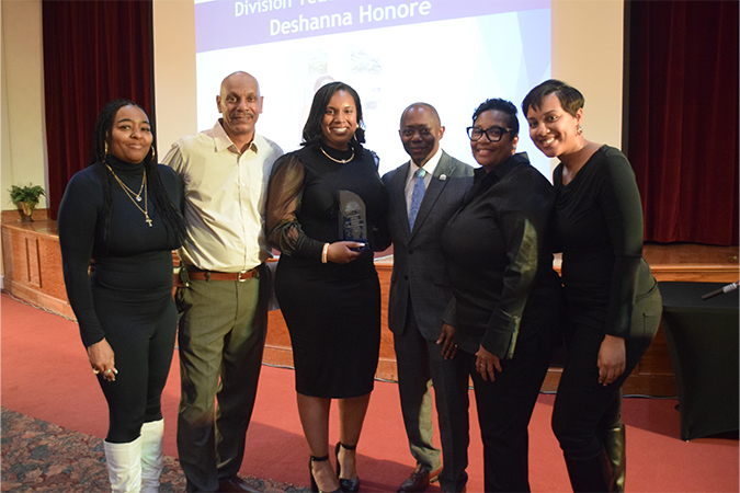 Deshanna Honore with Dr. Bracy and her family