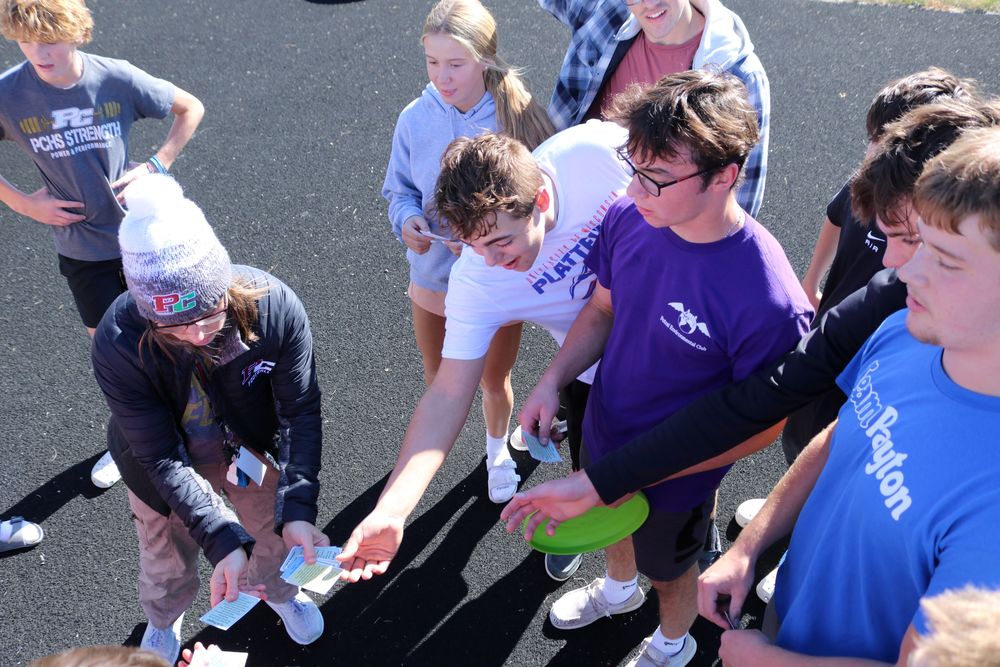 Members of FCA prep for ultimate frisbee