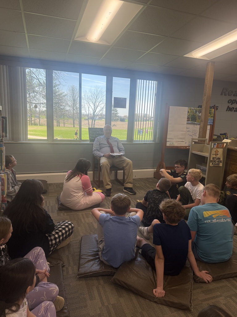 Mr Cohen reading to 5th grade