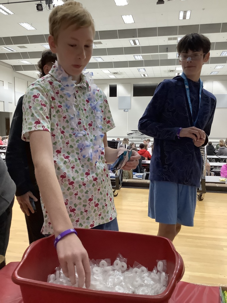 Image of members working booth