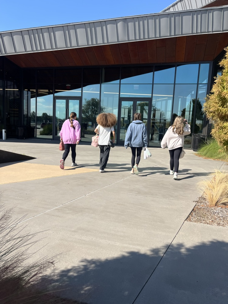 walking in the doors of the museum 