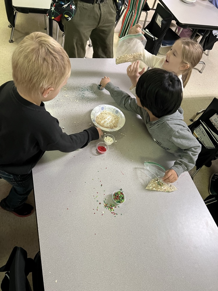 Students making reindeer food