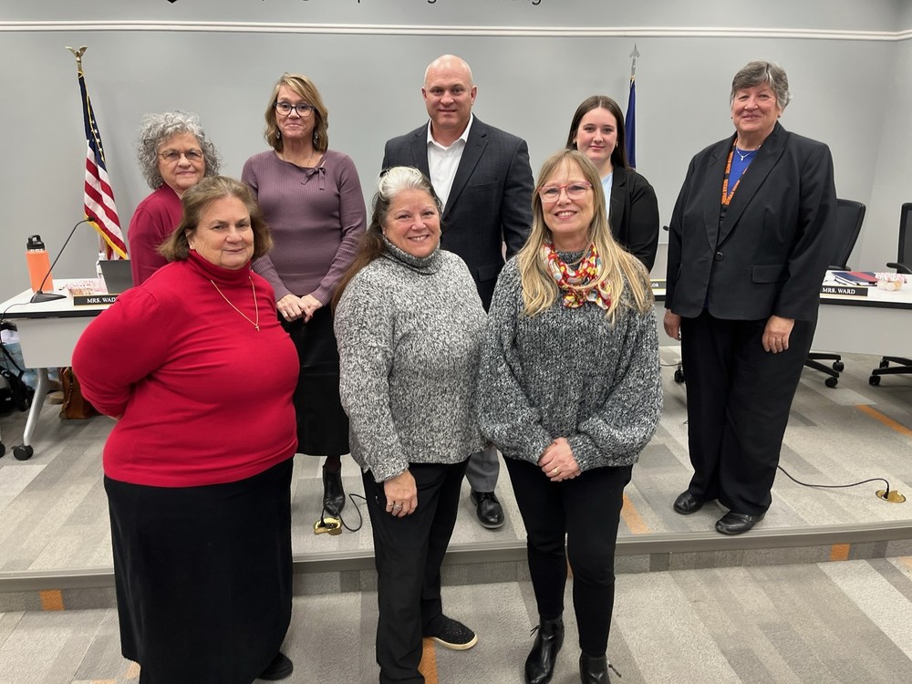 Alisa Detrick with school board members