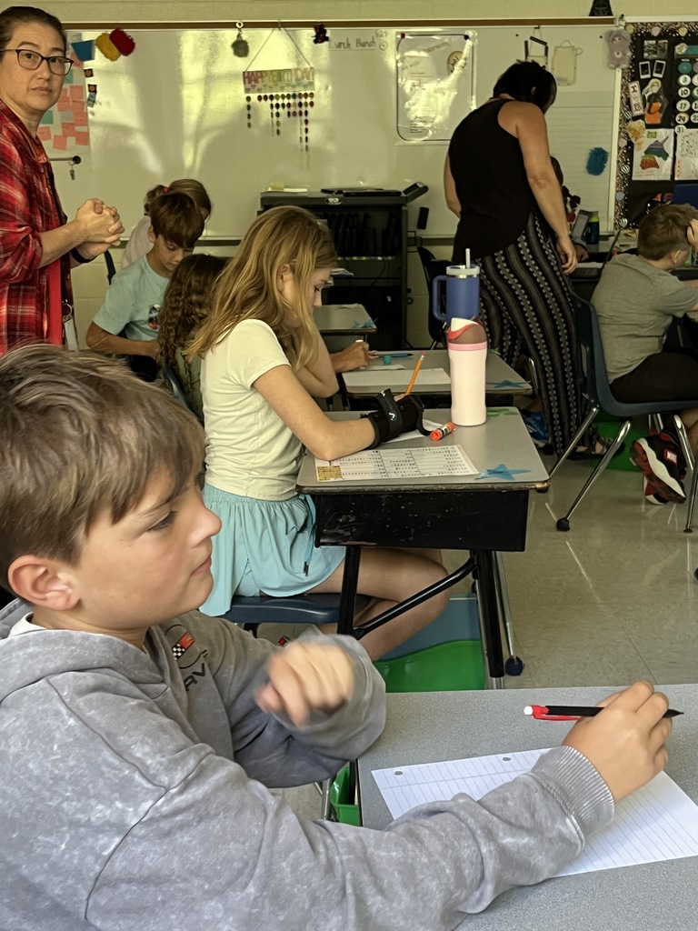 Students work on their first writing prompt exercise of the school year. 