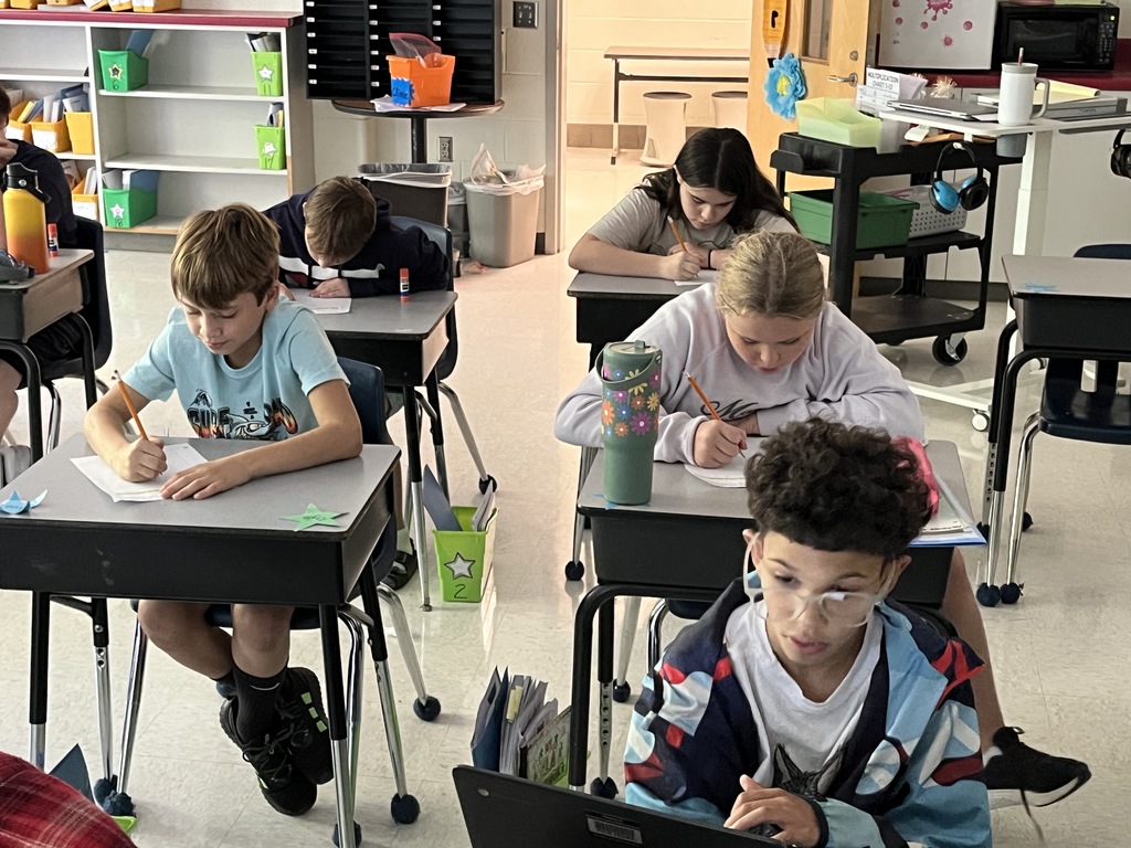 Students work on their first writing prompt exercise of the school year. 