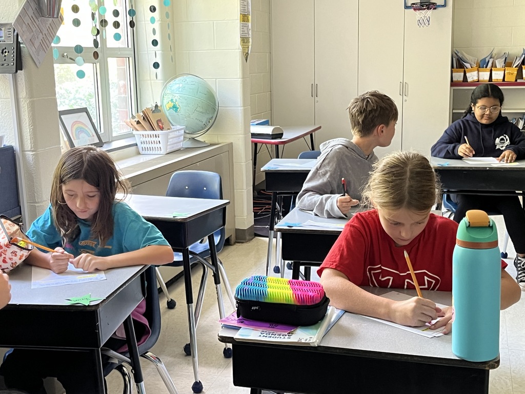 Students work on their first writing prompt exercise of the school year. 