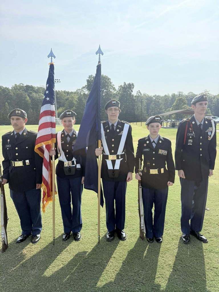 JROTC cadets  present  the Colors at a community event. 