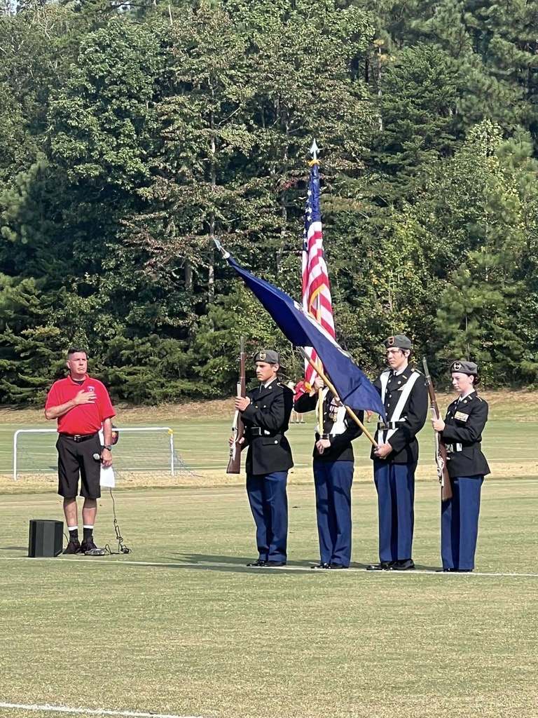 JROTC cadets  present  the Colors at a community event. 