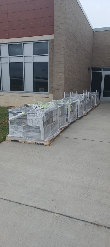 Pallets of Chromebooks arrive at a school to be assigned. 