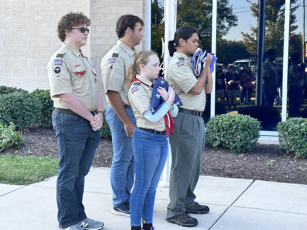 Boy Scout troop members present the colors during a 9/11 ceremony.