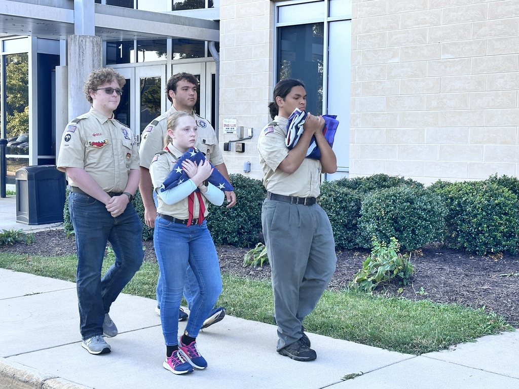 Boy Scout troop members present the colors during a 9/11 ceremony.