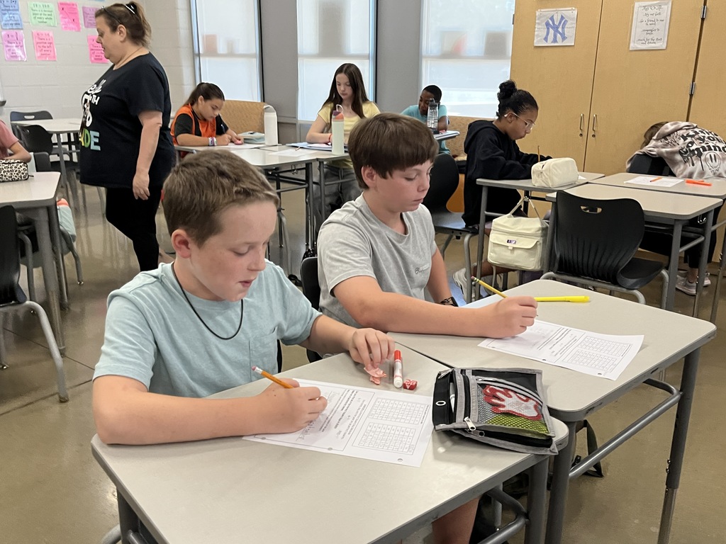 Students participate in a perfect square day activity. 