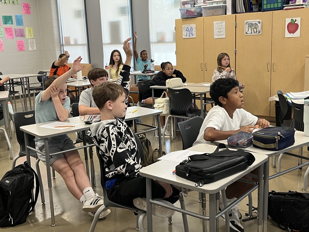 Students participate in a perfect square day activity. 