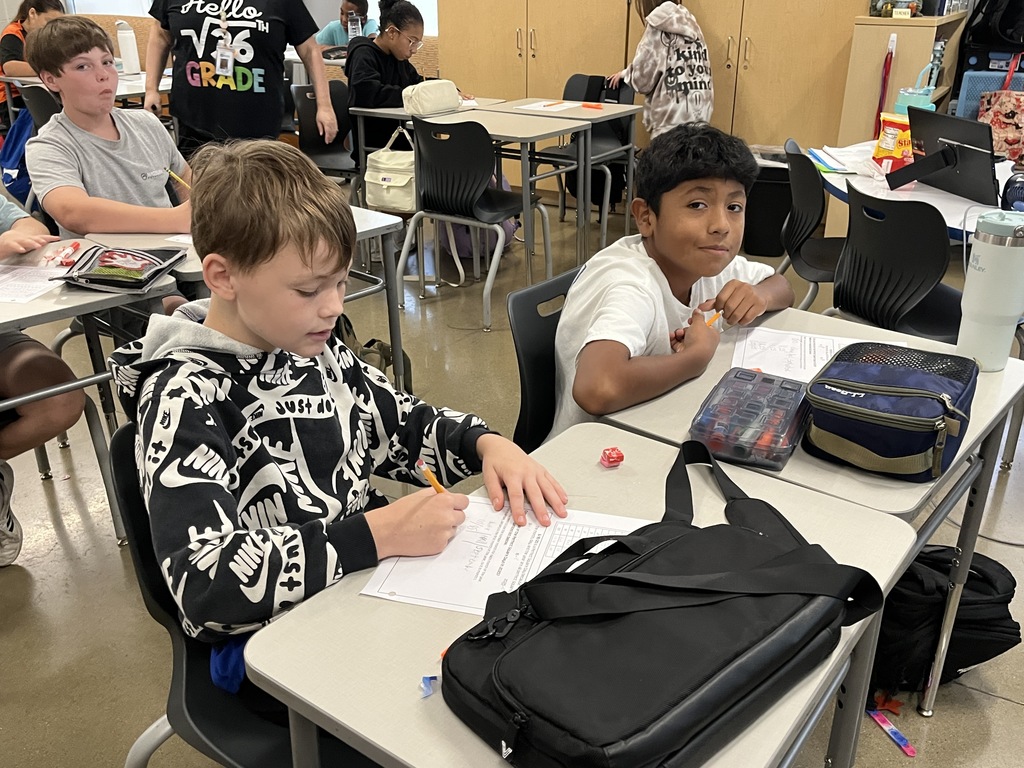 Students participate in a perfect square day activity. 