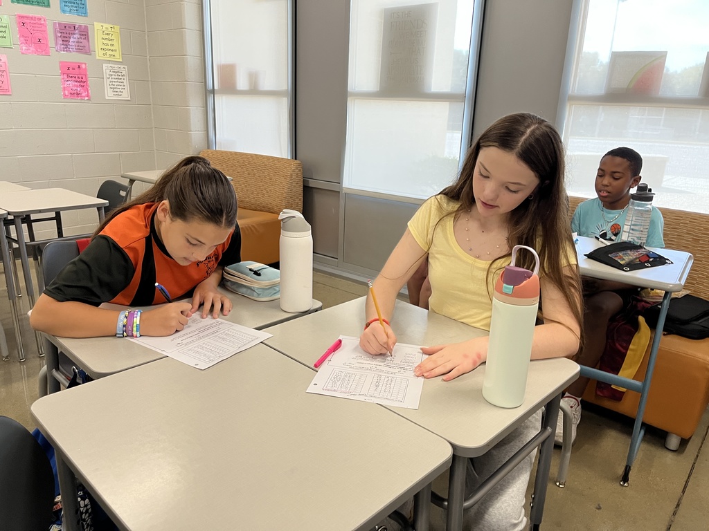 Students participate in a perfect square day activity. 