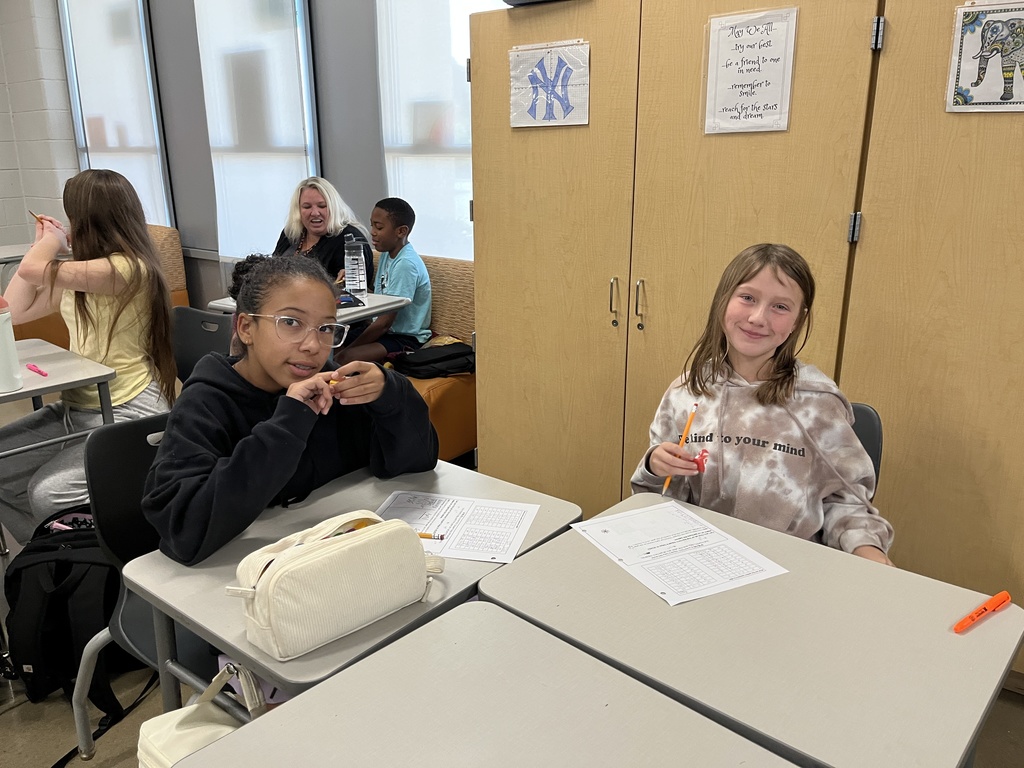 Students participate in a perfect square day activity. 