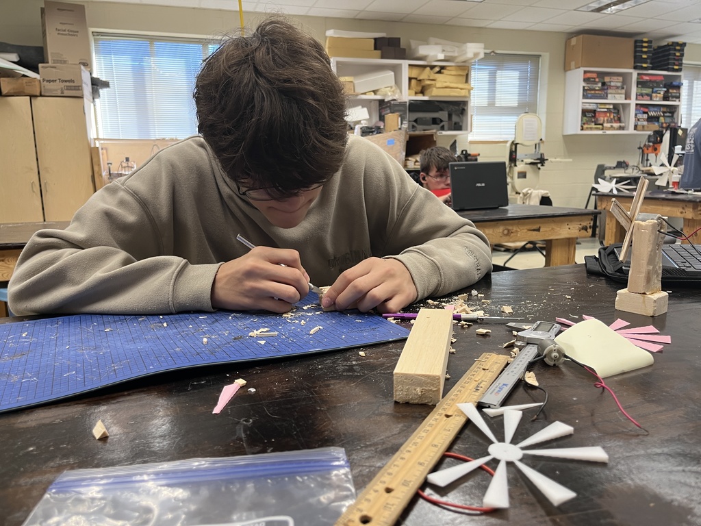 Students build wind turbines in engineering class.