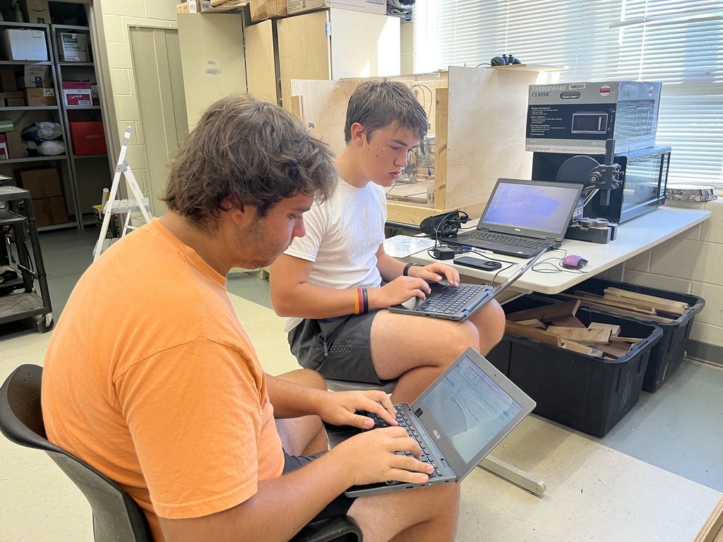 Students build wind turbines in engineering class.