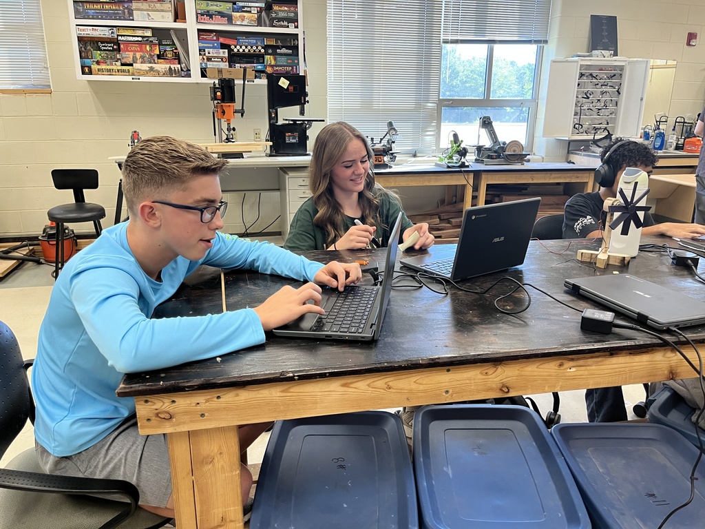 Students build wind turbines in engineering class.
