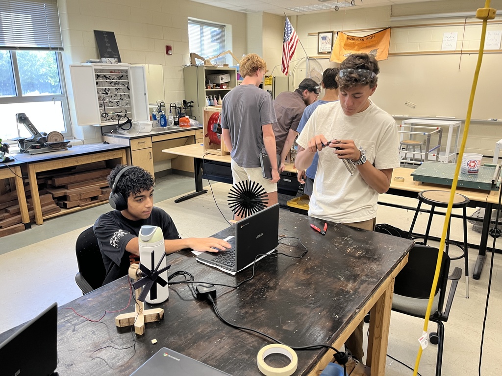 Students build wind turbines in engineering class.