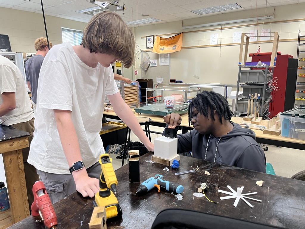 Students build wind turbines in engineering class.