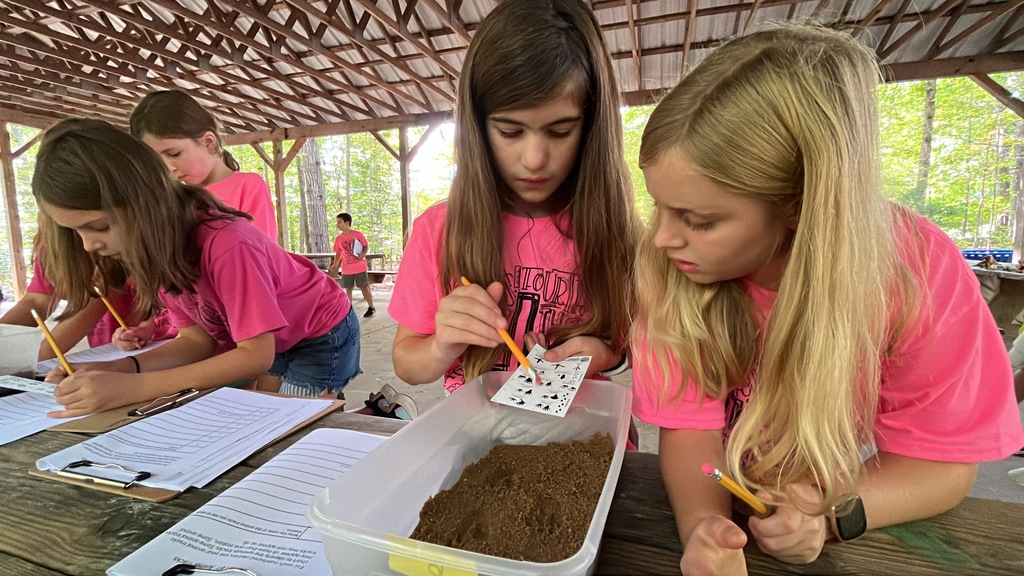Students learn about animal tracks. 