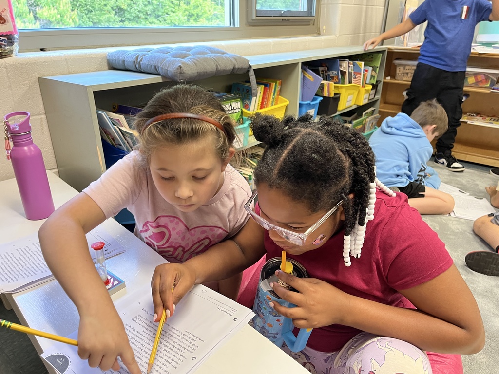 Students work in pairs and take turns reading an article aloud.