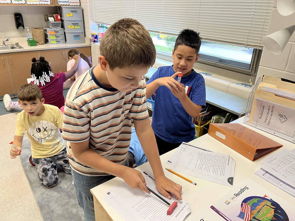 Students work in pairs and take turns reading an article aloud.