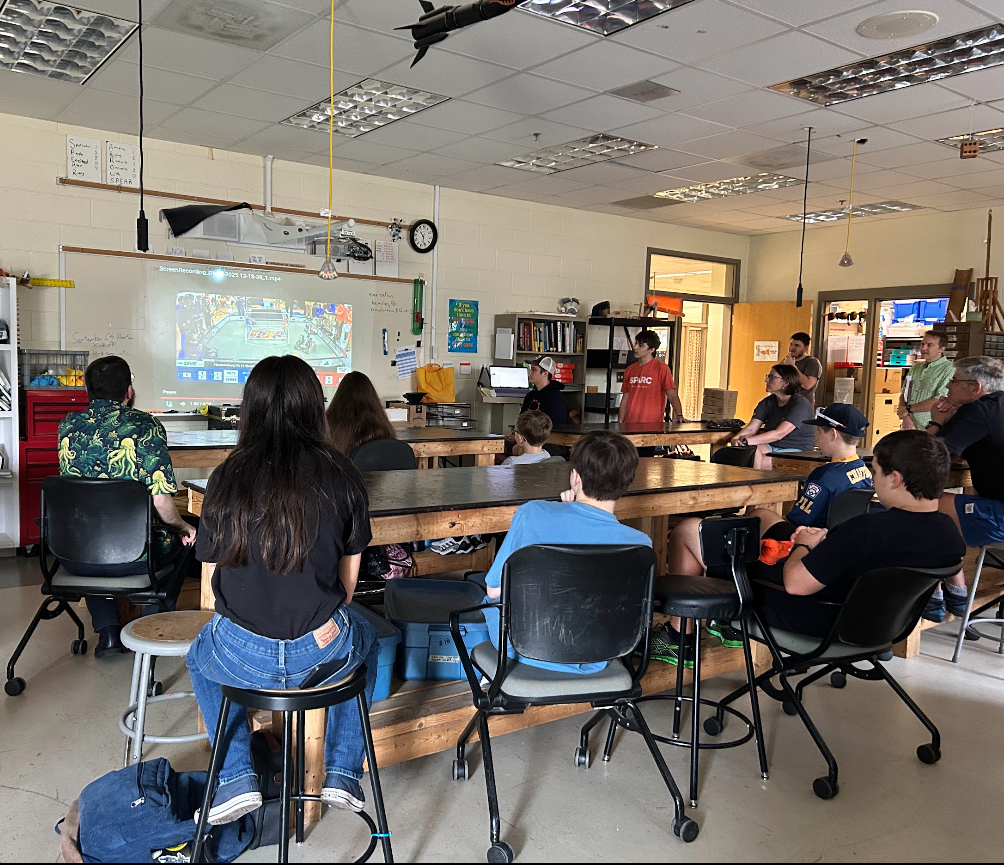 High school students talk about robotics.