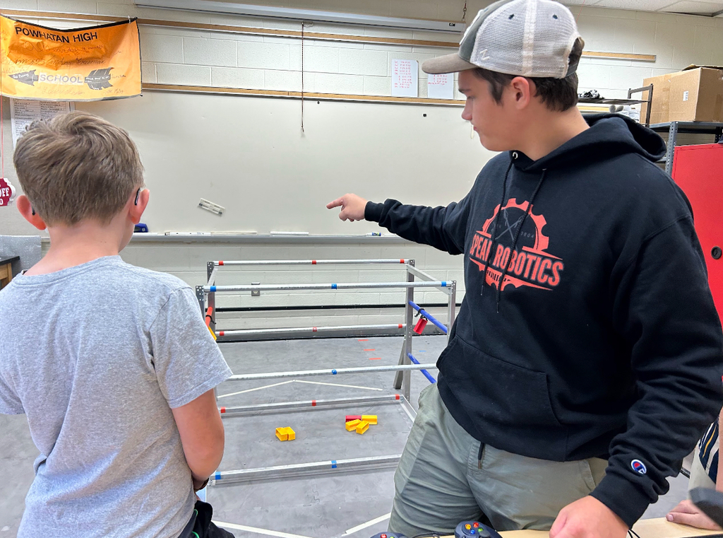 Students talk about robotics.