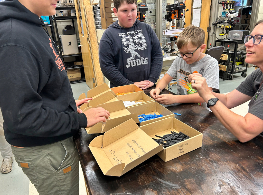 Students talk about robotics.