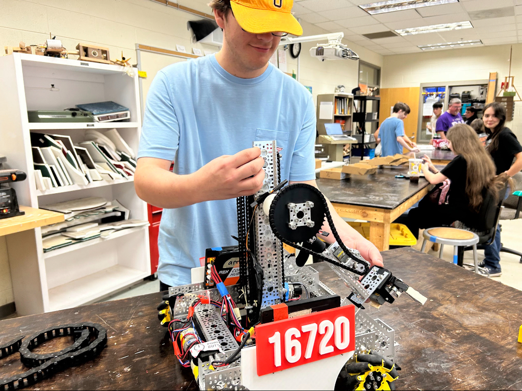 High school students talk about robotics.