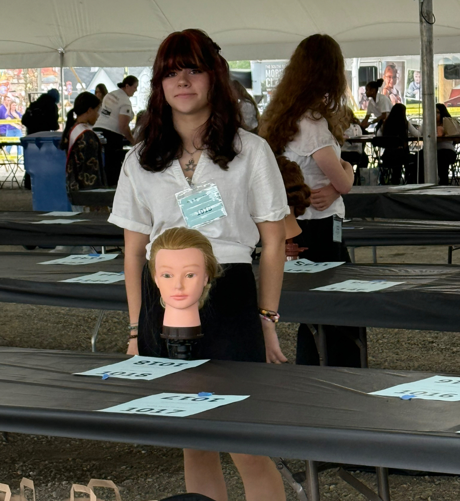 Students participate in a cosmetology competition at the state fair..