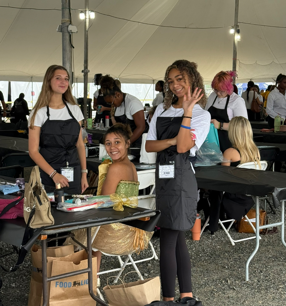 Students participate in a cosmetology competition at the state fair..
