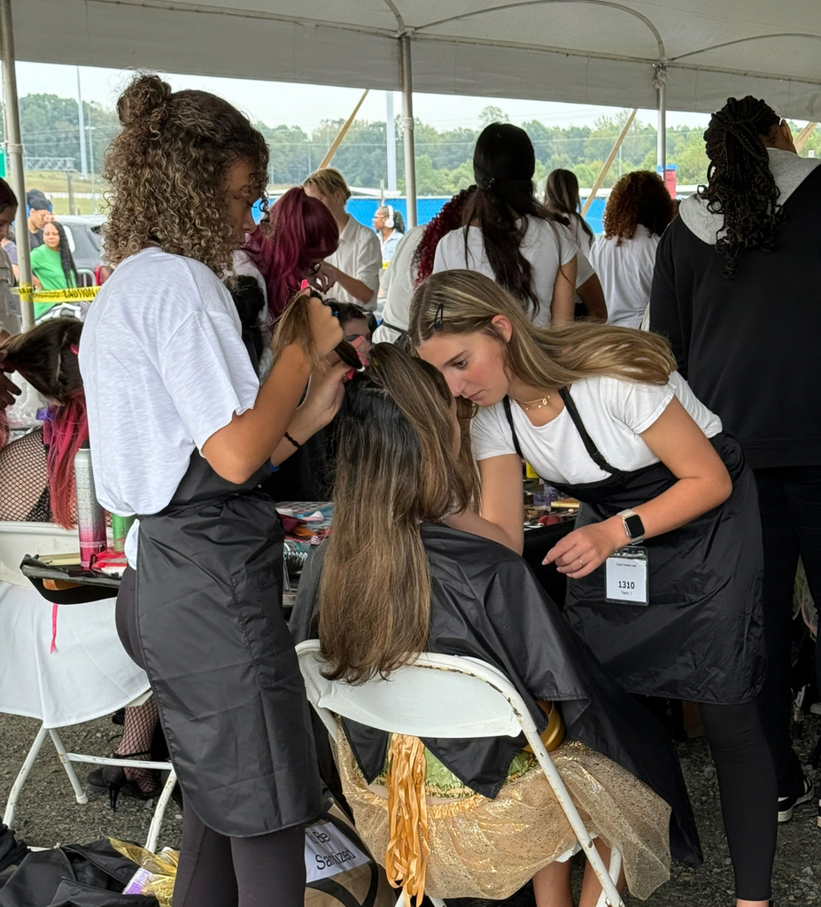 Students participate in a cosmetology competition at the state fair..