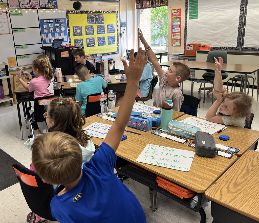 Students in a class explore all the different ways to represent a number.