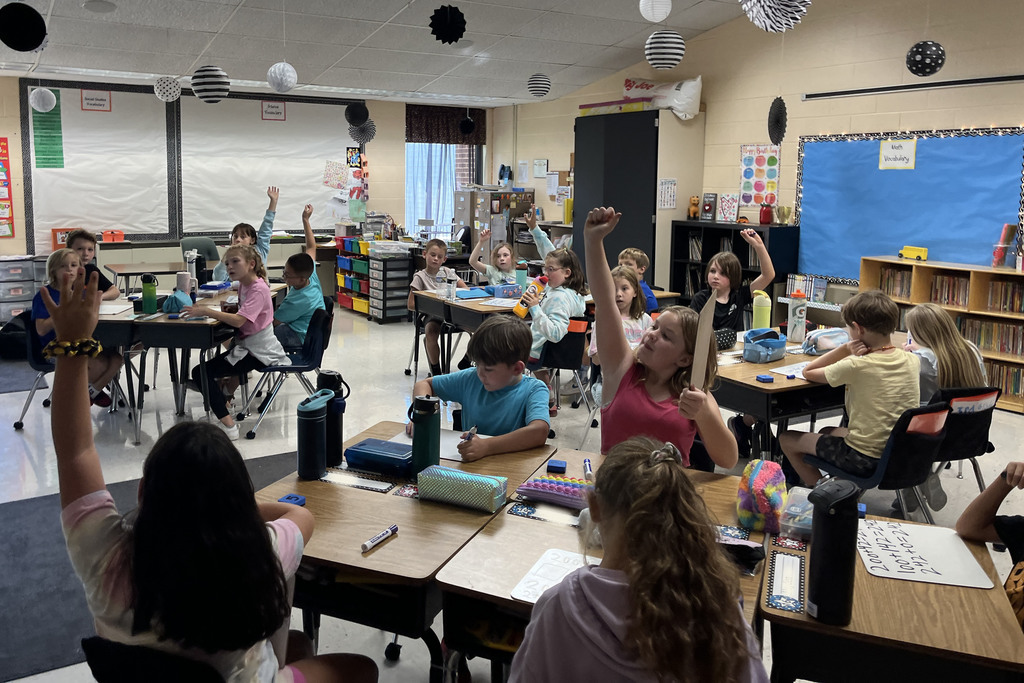 Students in a class explore all the different ways to represent a number.