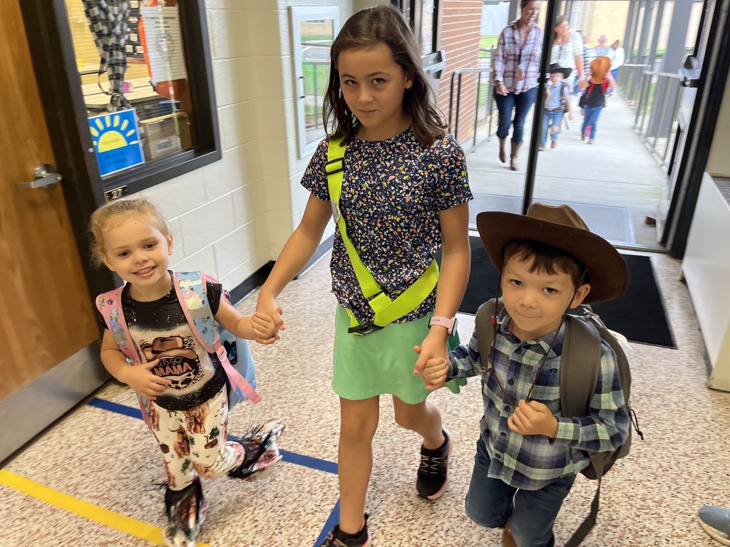 A student safety patrol member poses for a photo.