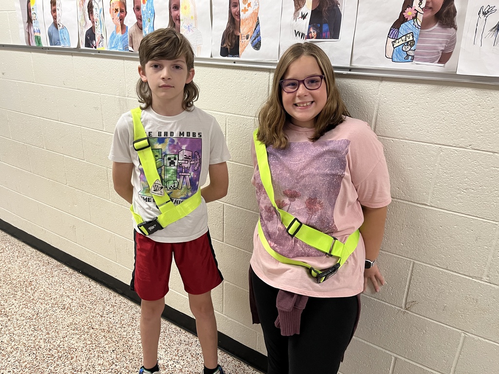 Student safety patrol members pose for a photo.